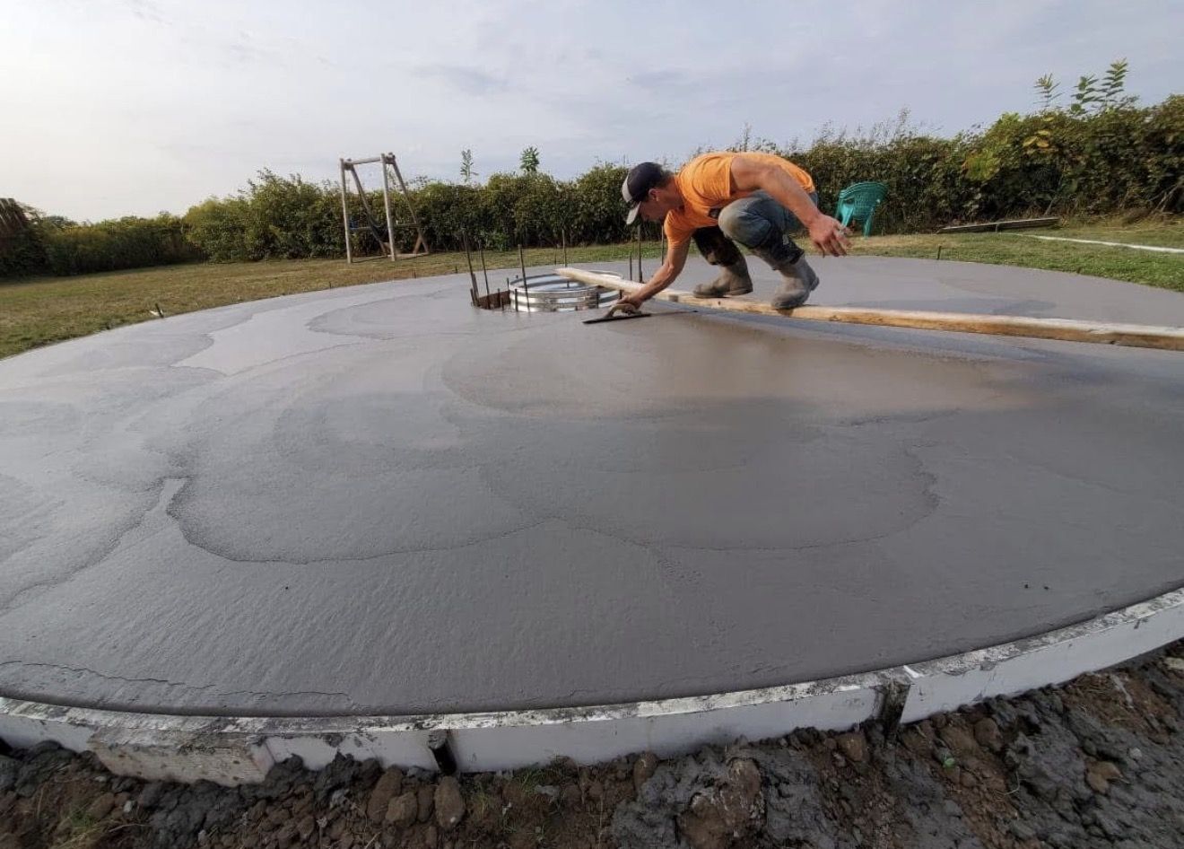 Hand-finishing a fresh concrete slab