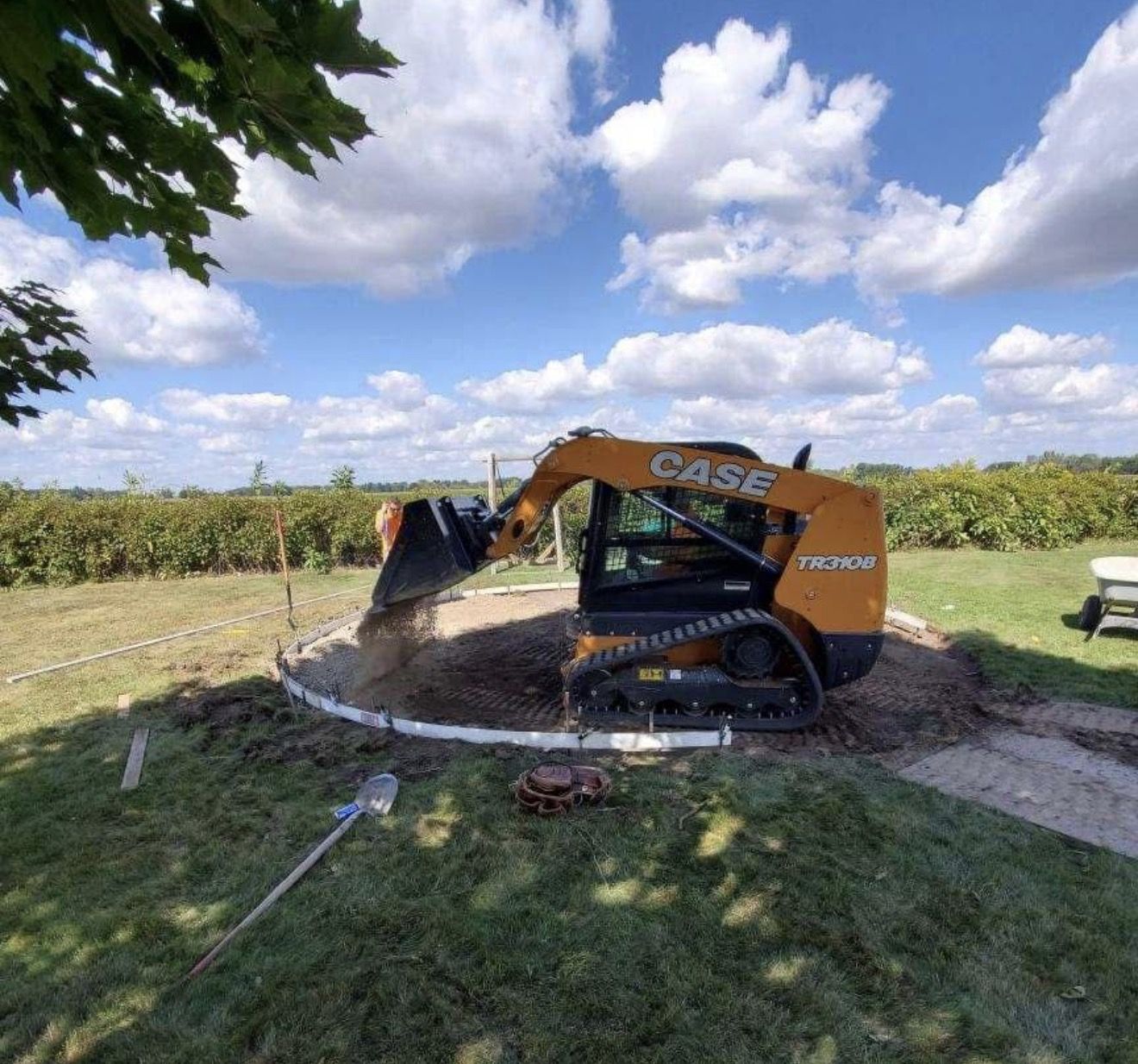 Site preparation with skid steer