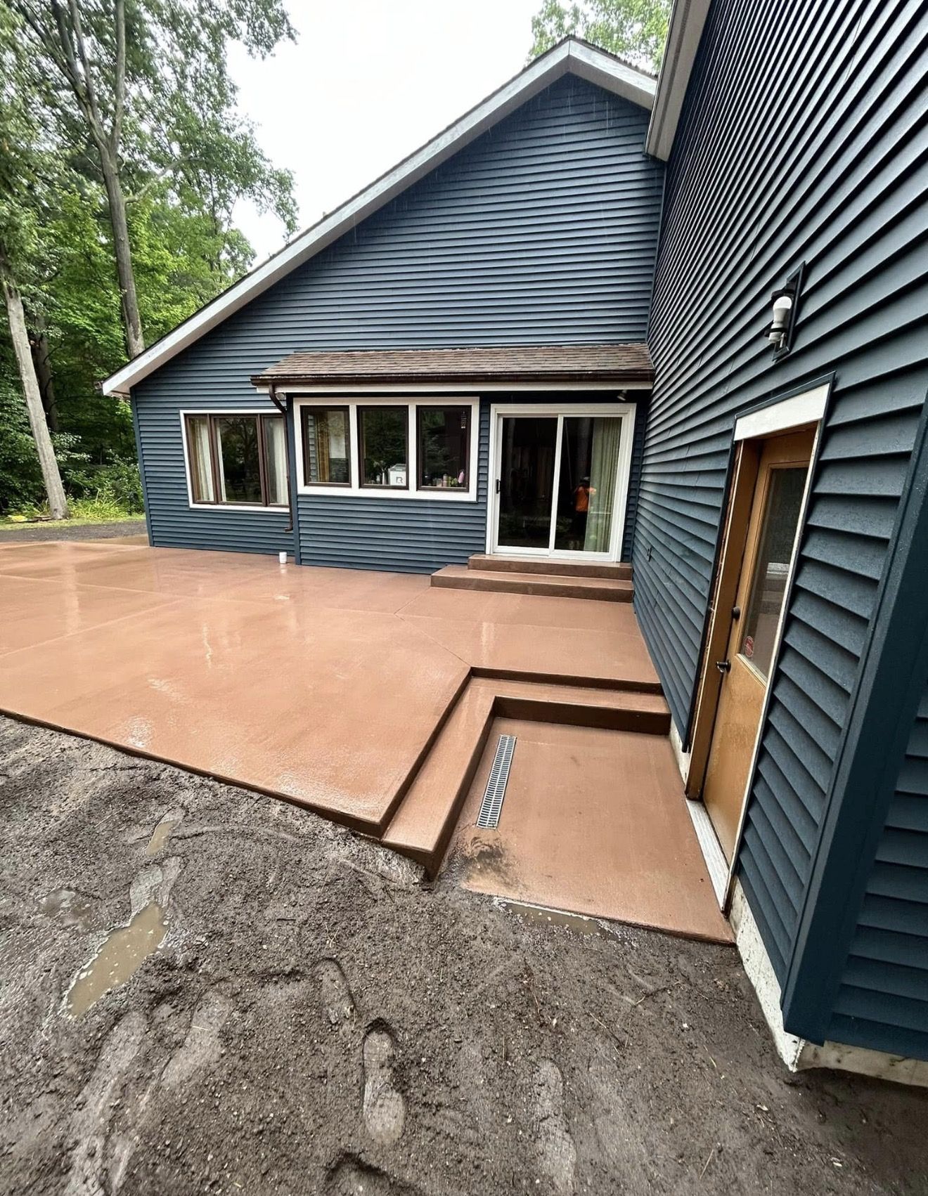 Colored decorative concrete patio with steps