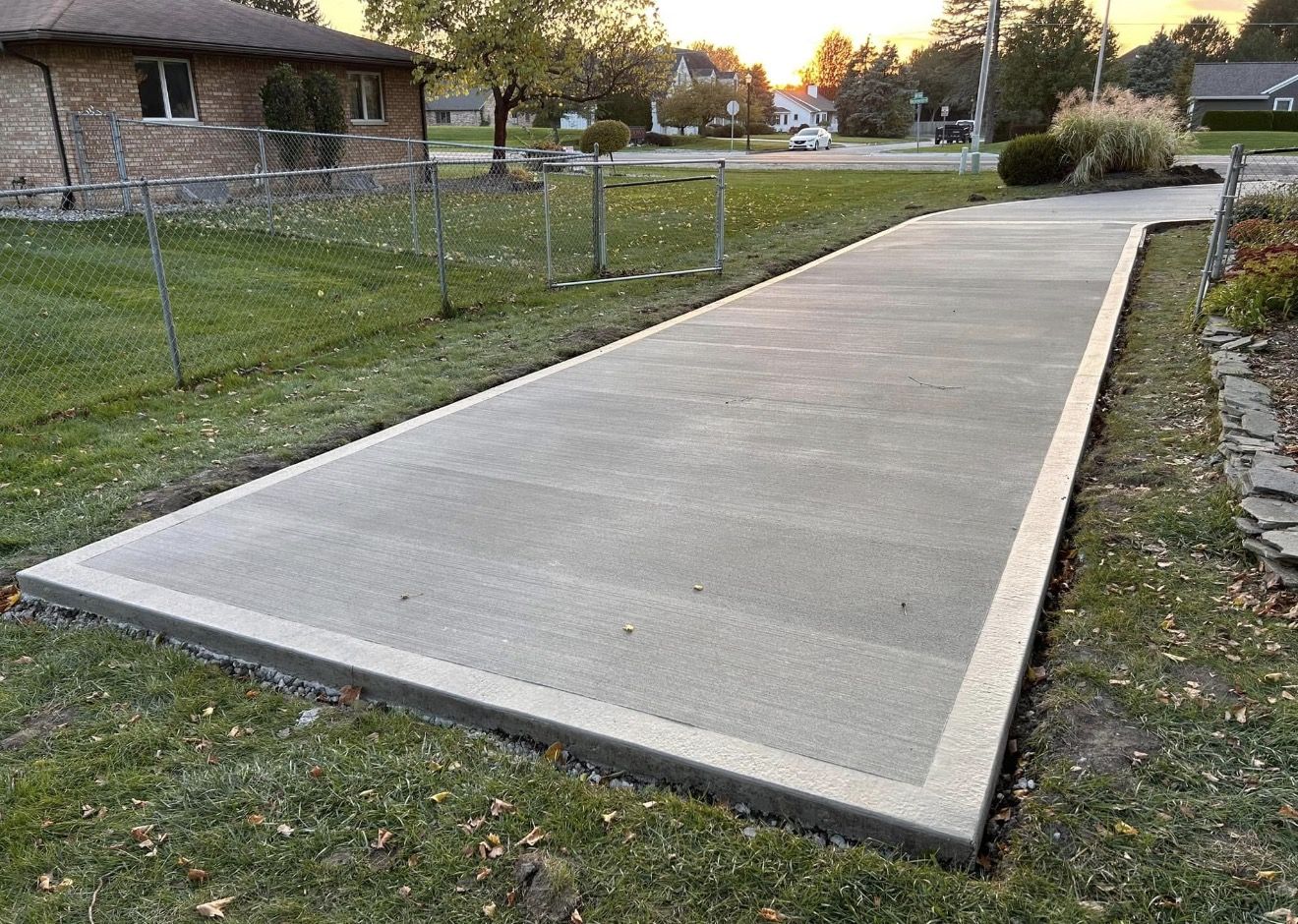 Concrete driveway with decorative banded border