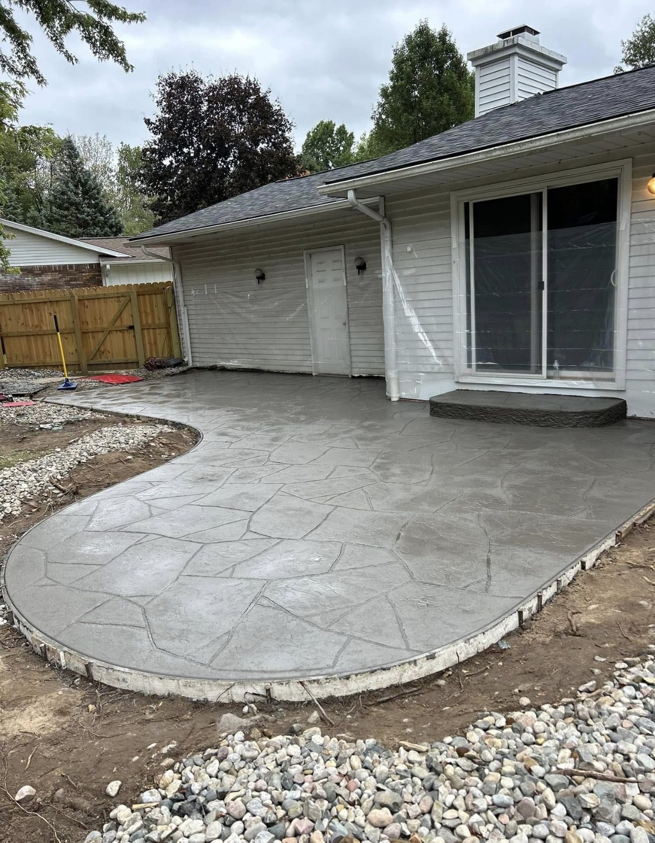 Stamped flagstone-pattern concrete patio